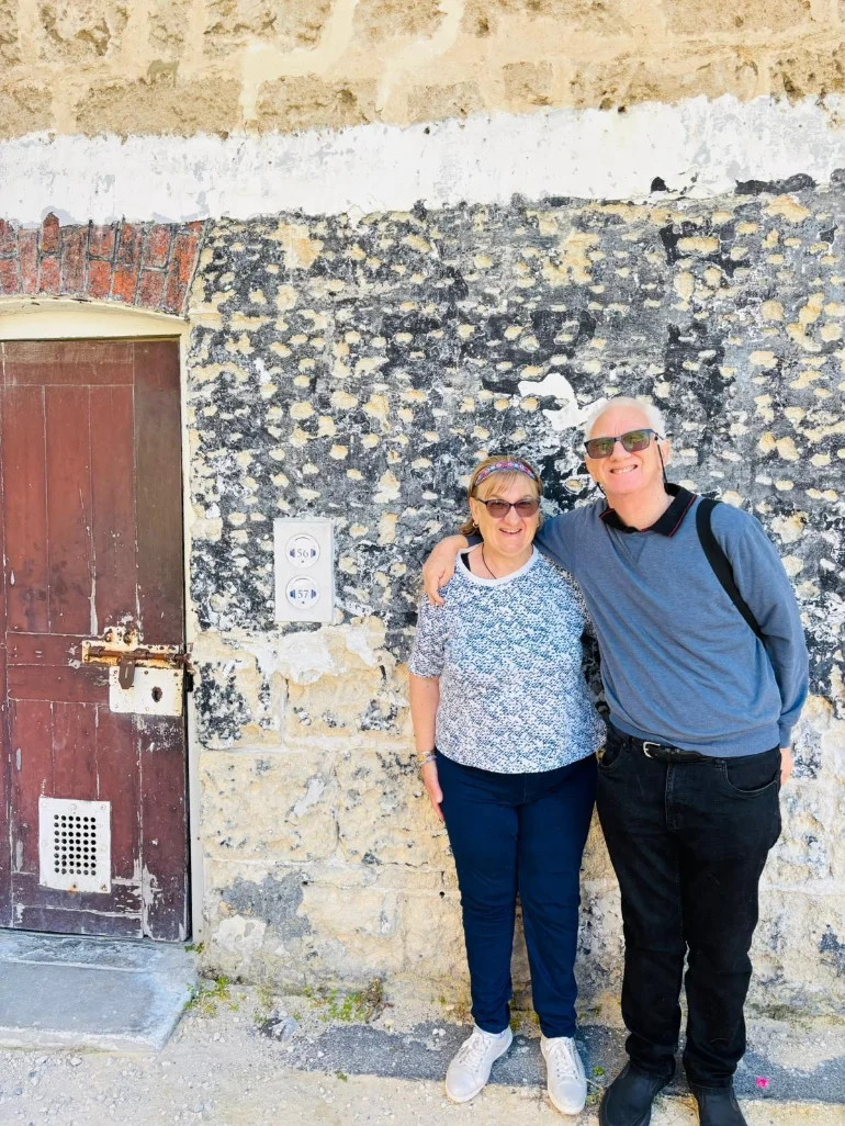 Two NDP participants smiling together while out in the community
